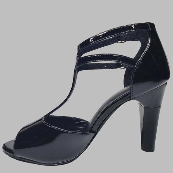 Black heeled women's shoe left side view. Featuring shock-absorbing heel and buckled strap for a comfortable wear.